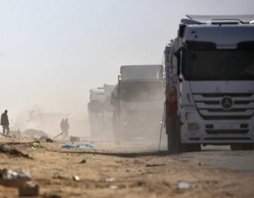 trucks carrying aid