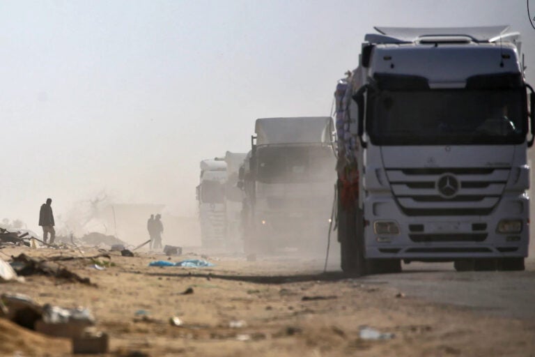 trucks carrying aid