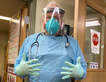 Dr. Kurt Papenfus in protective gear at the hospital