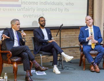 Philadelphia District Attorney Larry Krasner faces off against former judge Pat Dugan at the West Philadelphia Mennonite Fellowship district attorney forum on March 11, 2025.