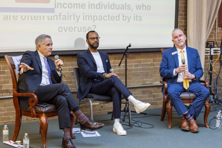 Philadelphia District Attorney Larry Krasner faces off against former judge Pat Dugan at the West Philadelphia Mennonite Fellowship district attorney forum on March 11, 2025.