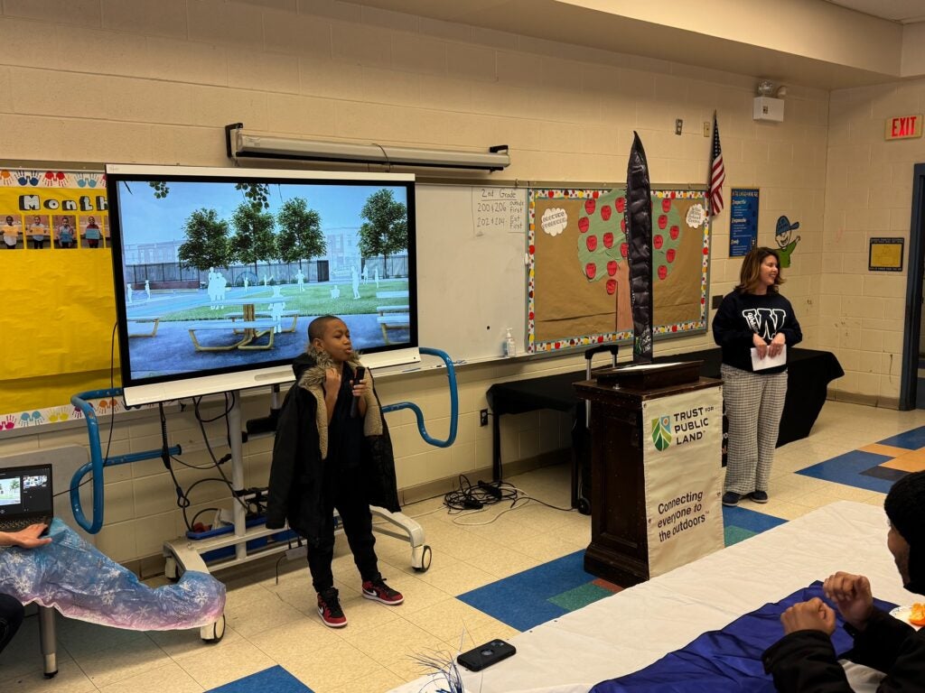 a student presenting in front of the class