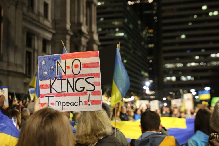 A sign with an American flag reads 