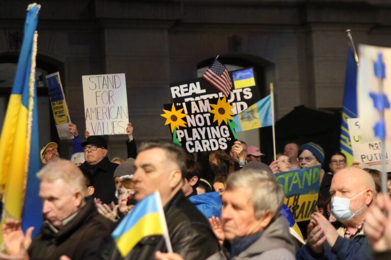 Several protestors gather outside City Hall in Philadelphia