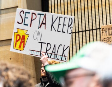 a sign reads SEPTA KEEPS PA ON TRACK