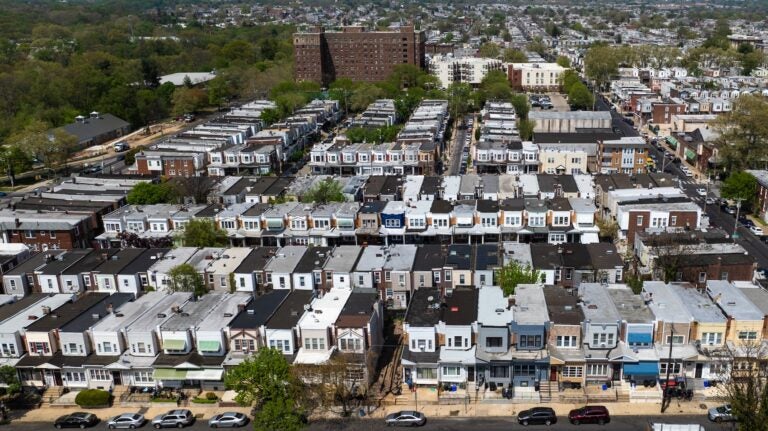 Row homes in Philadelphia. (Kimberly Paynter/WHYY) aerial view of residential blocks in Philly