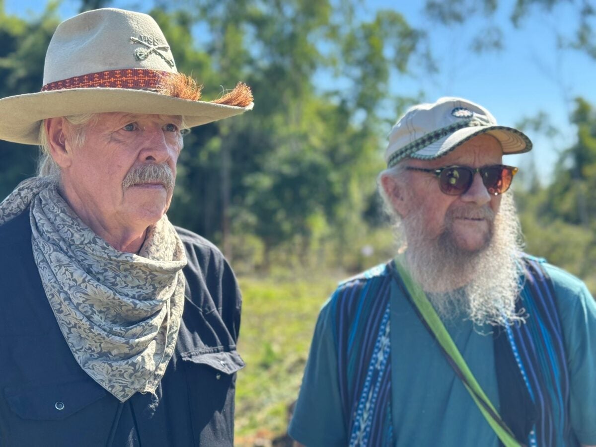 Don Super (left) and John Warren Jones (right) visited Laos to see the impact Operation Barrel Roll had on the country. (Courtesy of John Warren Jones)