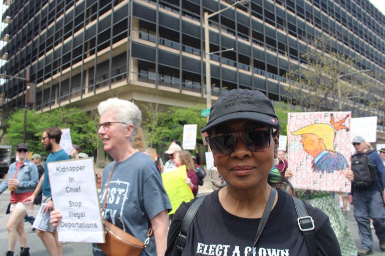 A woman attending a protest in Philadelphia against the Trump administration