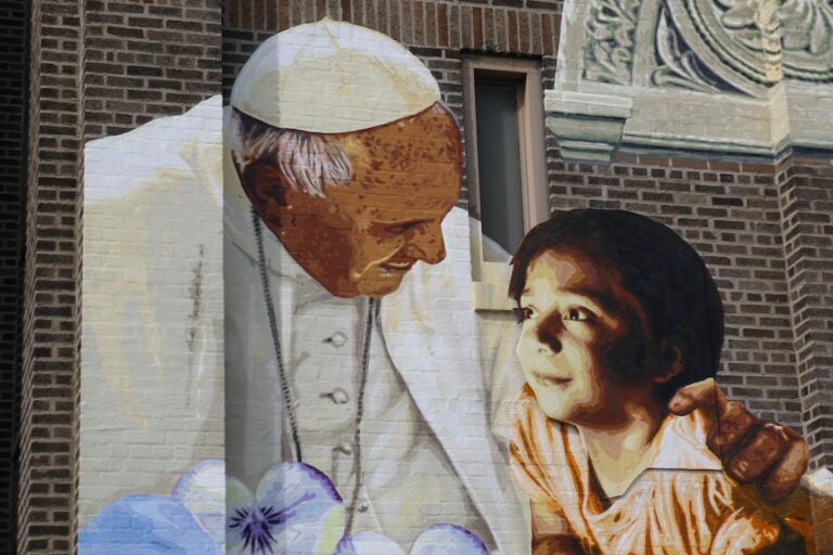 pope-francis-murals-philadelphia-CS-042425-02 Mural of Pope Francis and child on the facade of Saint Malachy School