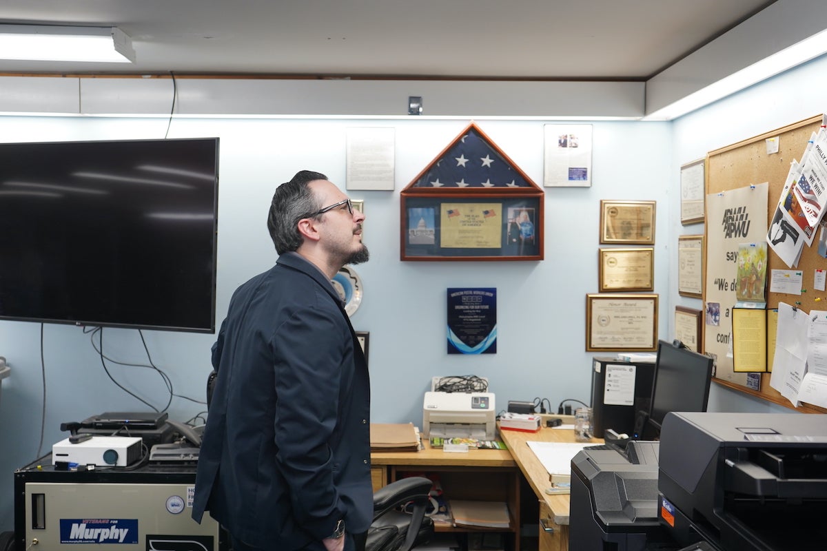 postal-workers-union-stand-against-trump-administration-KC-042525-03 James DeRidder standing in postal workers union office
