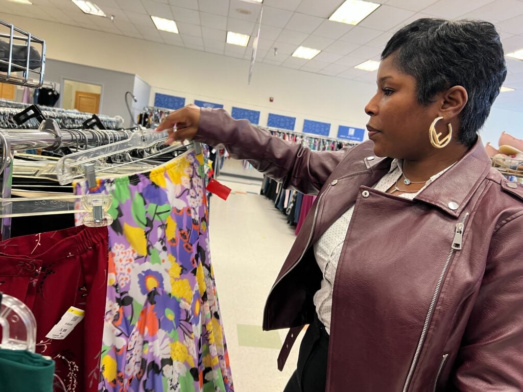 Woman observing clothing rack at B-Bop Vintage in Philadelphia