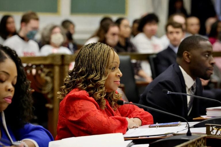 2024-01-25-e-lee-jamie-gauthier-philadelphia-city-hall-city-council-session-look-right-file Jamie Gauthier sits in front of a microphone
