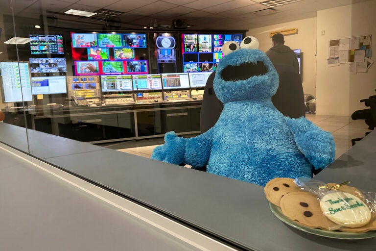Trump Media NPR PBS A stuffed Cookie Monster is seated in a control room at the Arizona PBS offices