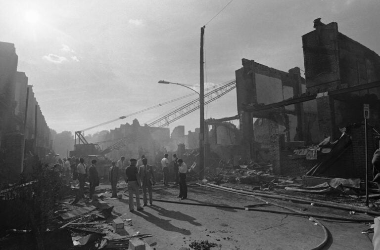 Clash Between Radical Group MOVE and Police Two city blocks of rowhouses are left in ruin following the worst fire in the city's history, May 15, 1985 in West Philadelphia. The blaze was caused accidently when police attempted to remove a radical group called MOVE from their house by dropping a satchel bomb on the structure a gun battle. (AP Photo)