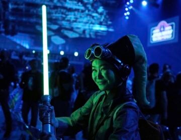 A Star Wars fan poses for a photo during a fan convention called the Star Wars Celebration (AP Photo/Hiro Komae, File)