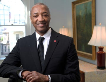 the new Rutgers University president, William Tate IV, smiles