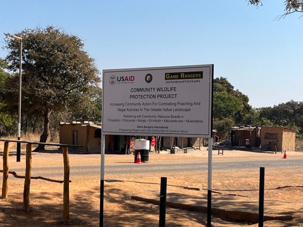 Sign for the U.S. AID's Community Wildlife Protect Project