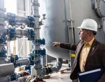 Marc Lucca explaining PFAS filtration tanks