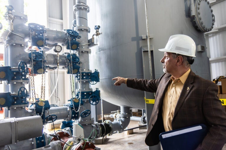 aqua-in-chalfont-pa-pfas-treatment-bucks-county-KP-053025-12 Marc Lucca explaining PFAS filtration tanks