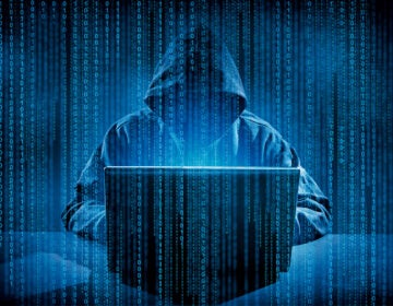 Save Download Preview Hacker using laptop. Hacking the Internet.