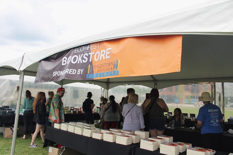 Hundreds of people attended the main event of the seventh annual Bucks County Book Festival on Saturday, May 3, 2025, at Broad Commons Park in Doylestown. (Emily Neil/WHYY)