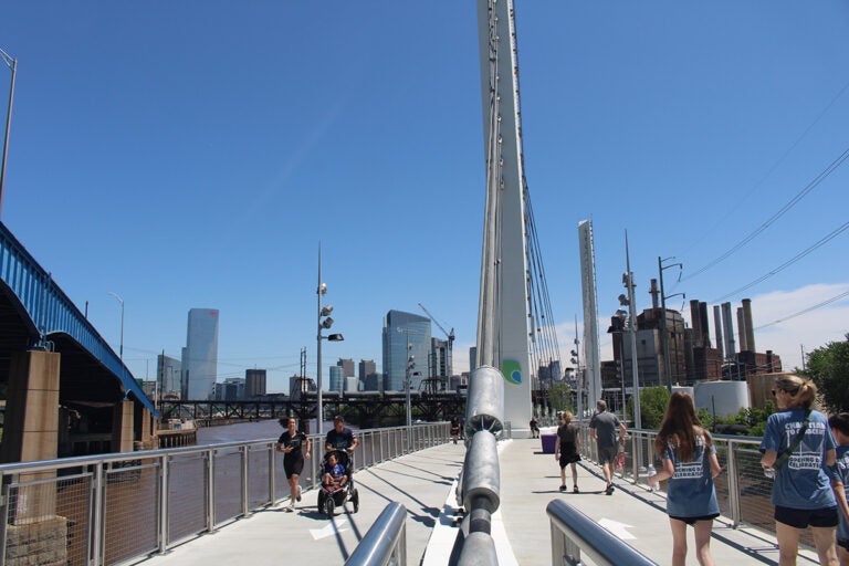 The new Christian to Crescent section of the Schuylkill River Trail, a 650-foot cable bridge, opened on May 17, 2025. (Emily Neil/WHYY)