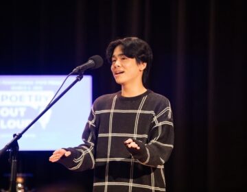 Evan Wang performs on stage at the Pennsylvania State Poetry Out Loud Championship