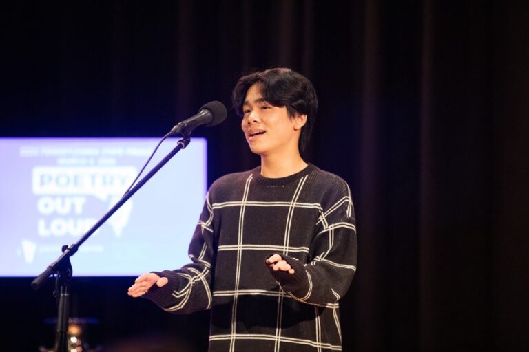 evan-wang-national-youth-poet-laureate-2 Evan Wang performs on stage at the Pennsylvania State Poetry Out Loud Championship