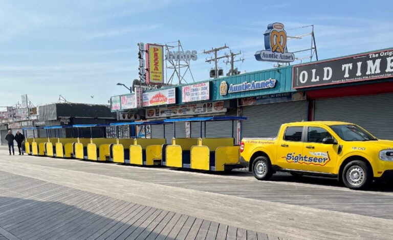 ford-truck-wildwood-boardwalk-tram-cars A hybrid Ford Maverick truck towing the tram car on the Wildwood Boardwalk