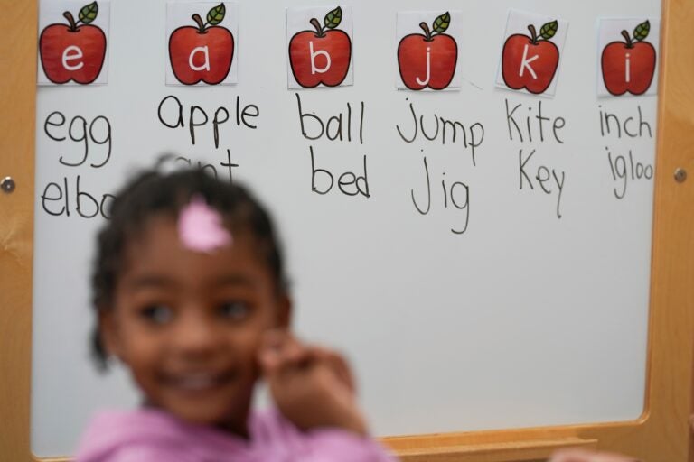 head-start-ap-file A student participates in a reading and writing lesson at a Head Start program in Florida