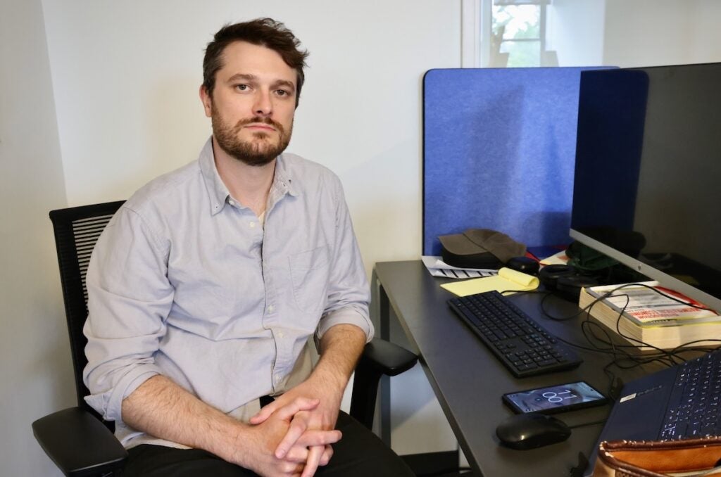 Jeremy Springman sitting at desk