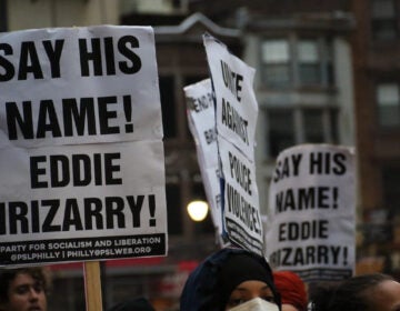 Hundreds of people protest in Philadelphia against Mark Dial's charges being dropped. Signs read SAY HIS NAME! EDDIE IRRIZARRY!