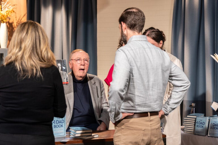 Writer James Patterson signing his new book for fans