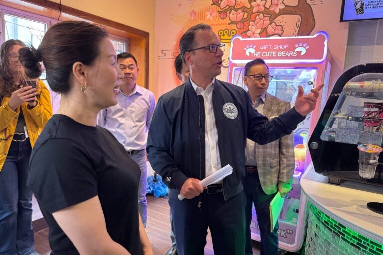 Josh Shapiro talks with RongYan Lin, owner of Vivi