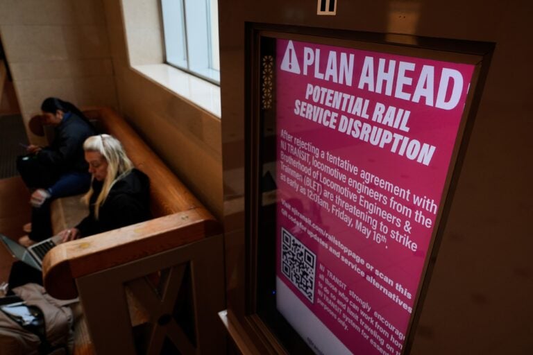 An electronic display advises commuters of potential NJ Transit service disruptions at the Secaucus Junction station