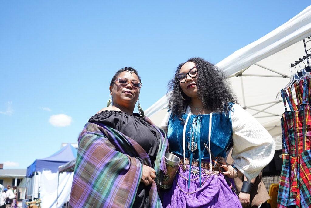Two women pose in medieval garb