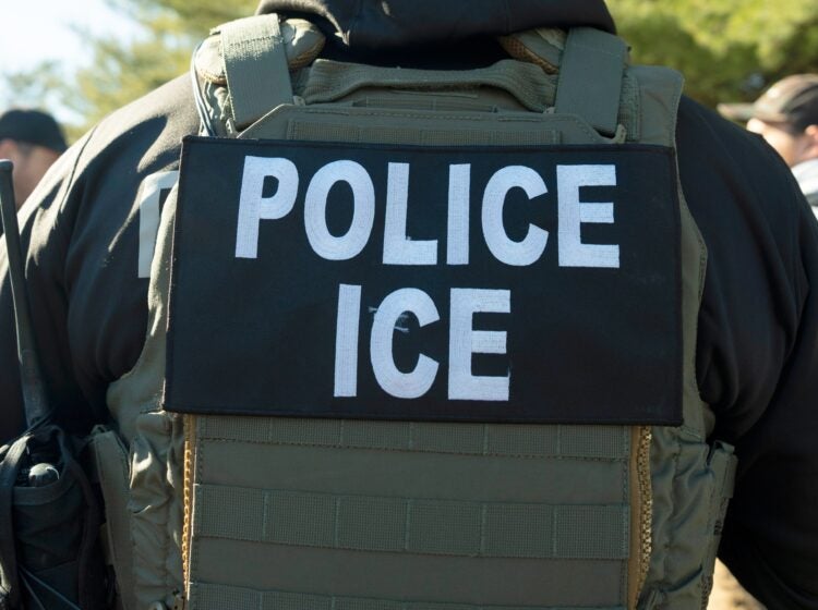 the back of A U.S. Immigration and Customs Enforcement officer