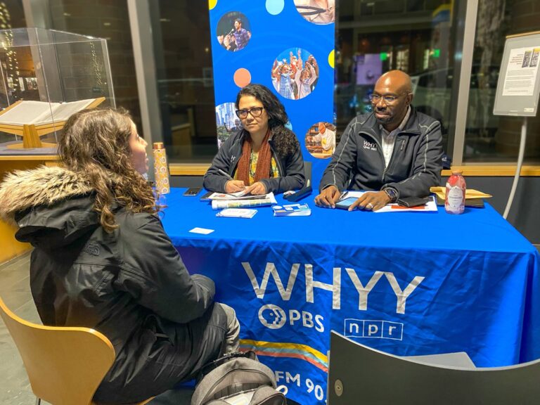 princeton-public-library-whyy-pup-up-newsroom-2024 WHYY's pop-up newsroom at Princeton Public Library. Madhu Bora and P. Kenneth Burns speak with an attendee
