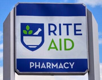 A sign for a Rite Aid Pharmacy