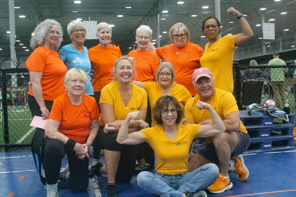 Sally’s Iron Mustang Team members and coach