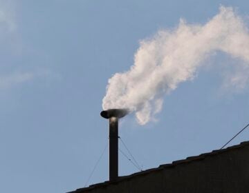 White smoke coming out of the chimney