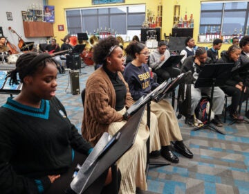 Many students rehearsing music at Creative Arts High School