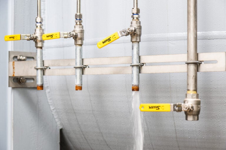 05-30-2025-k-paynter-aqua-chalfont-pennsylvania-pfas-treatment-bucks-county-file Pipes attached to PFAS filtration tanks