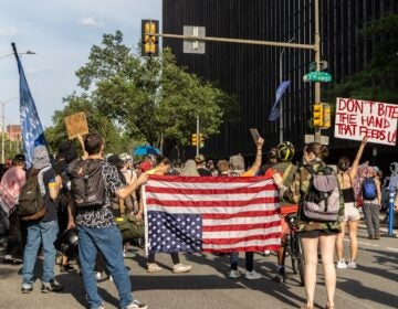 Protesters call for an end to deportations outside the Federal Detention Center on Arch Street in Philadelphia on June 10, 2025.