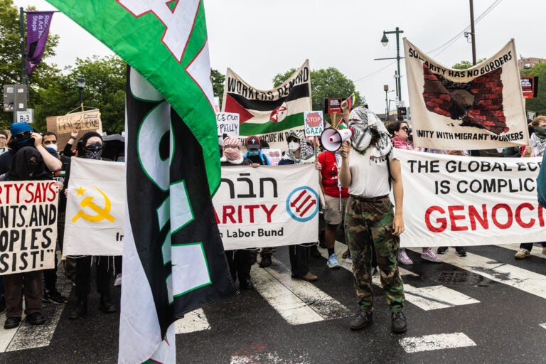 A group of protesters chanted “stop starving Gaza” during the No Kings rally at the Philadelphia Museum of Art on June 14, 2025. (Kimberly Paynter/WHYY)