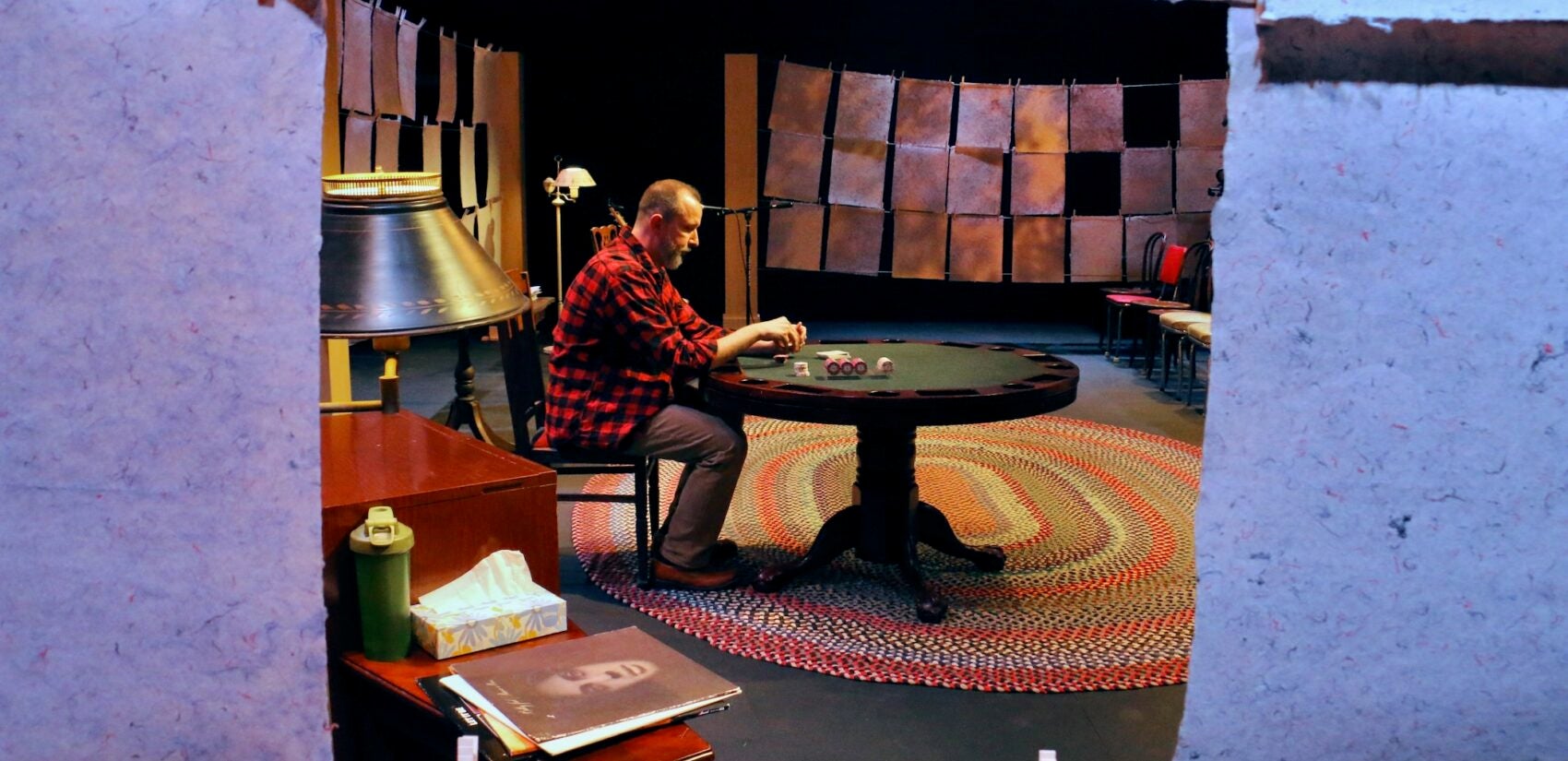 2023 01 11-e lee-charlie delmarcelle-philadelphia louis bluver theatre at the drake-shadow that broke the light paper An actor on stage during a performance