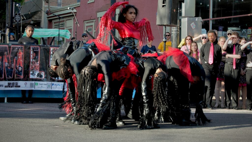 Maci Lago Universe dancers perform