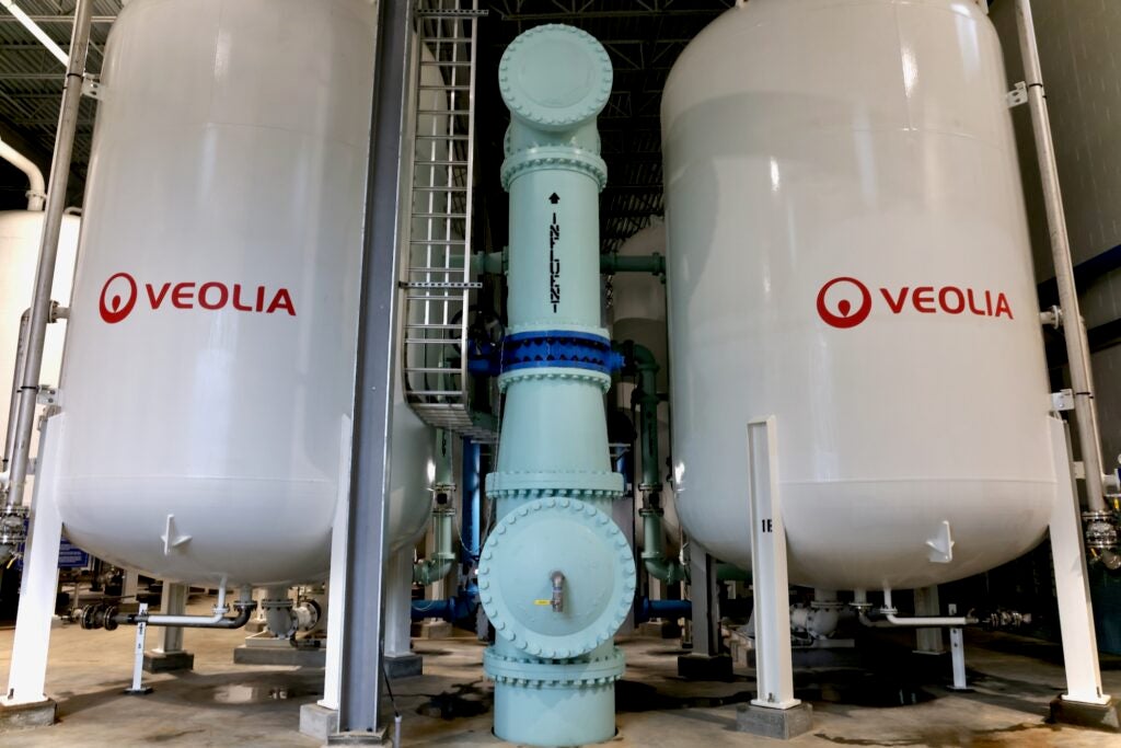 Tanks used to treat water for PFAS stand at Veolia's Stanton treatment plant