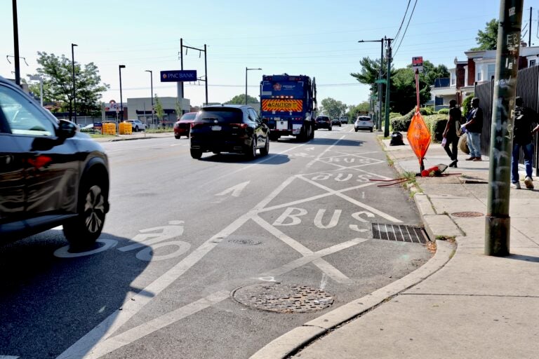 A car encroaches on the bike lane at the intersection of Baltimore Avenue, Cobbs Creek Parkway and 58th Street