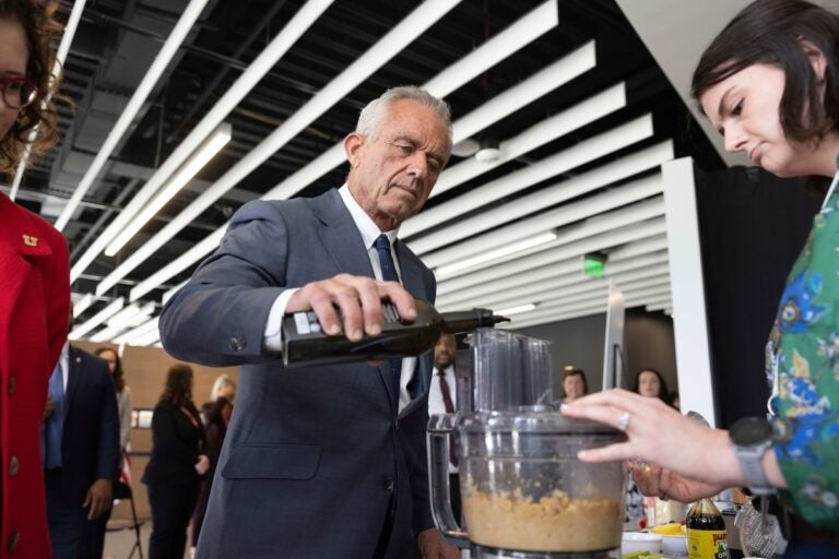 RFK Jr. U.S. Health Secretary Robert F. Kennedy Jr. assists in a demonstration as he visits the Osher Center for Integrative Health at the University of Utah, Monday, April 7, 2025, in Salt Lake City. (AP Photo/Melissa Majchrzak)